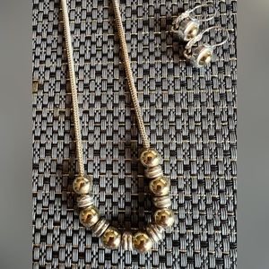 Silver and Goldtone beaded necklace with matching earrings.